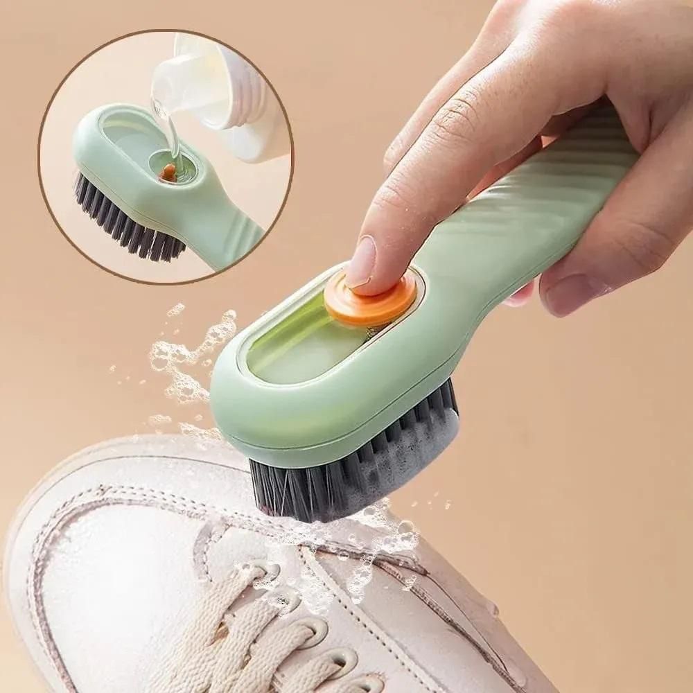 multi-purpose cleaning brush with built-in soap dispenser
